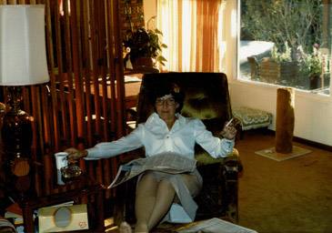 Mom, paper, cigarette and coffee, 44 McKenzie, early 1980's.