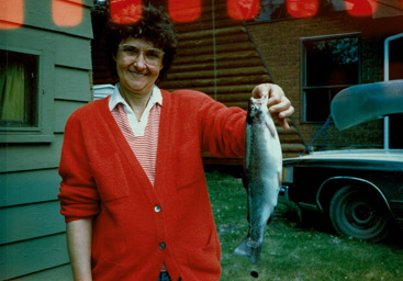 Mom with rainbow trout at the cabin, July, 1990.