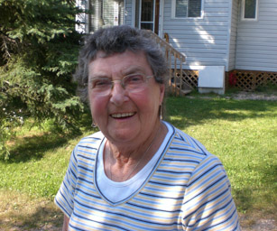 Marj at cabin, PANP, hair coming back after chemo, 2008.