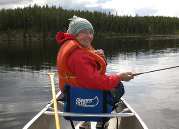 Mom fishing with Murray, mabye Grassy Lake, SK.