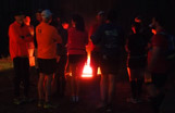 Runners warming up around a fire. It was cool, 34 - 38 F before the start.